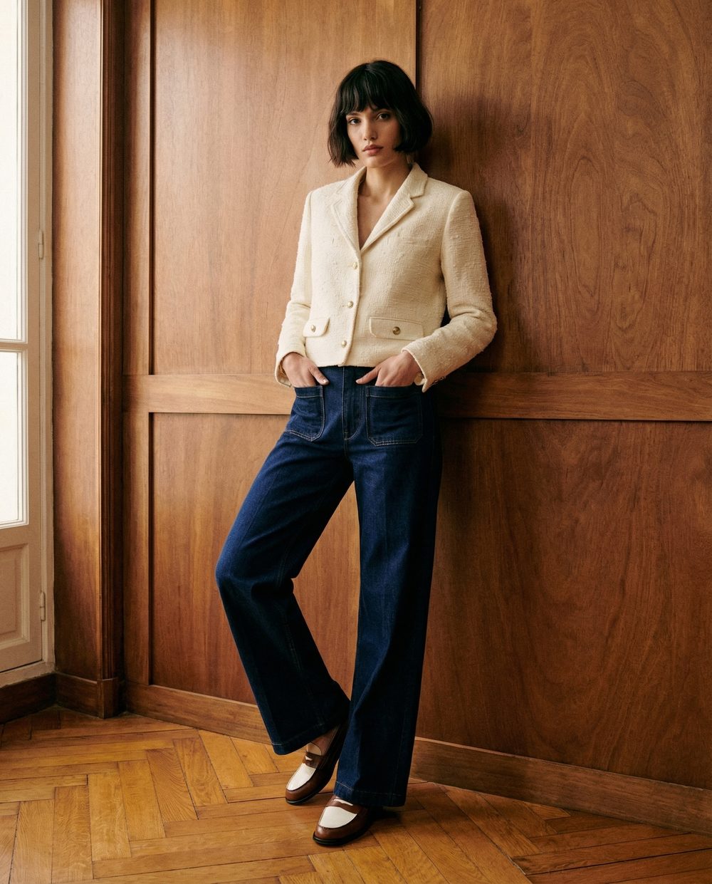 Editorial fashion visual — cream jacket and denim